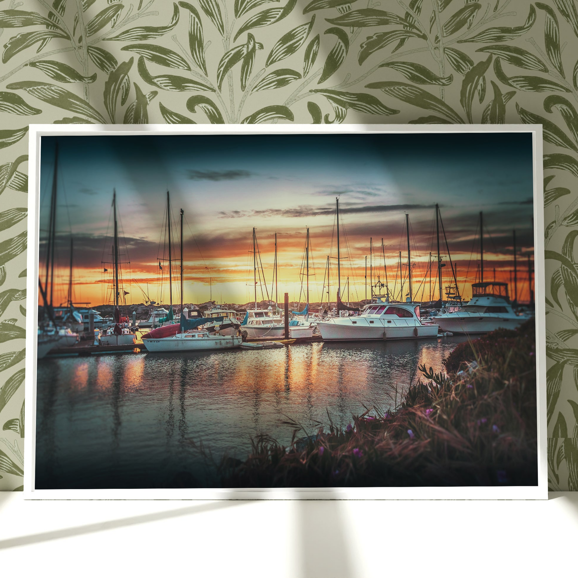 a painting of boats in a harbor at sunset