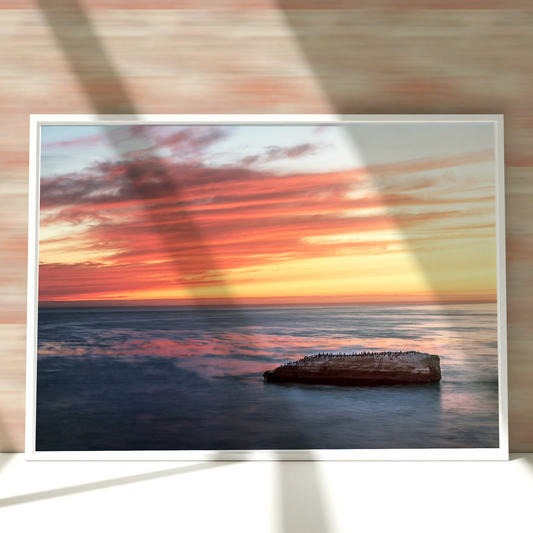 a picture of a picture of a sunset over the ocean