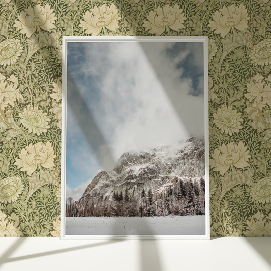 a picture of a snowy mountain in a frame