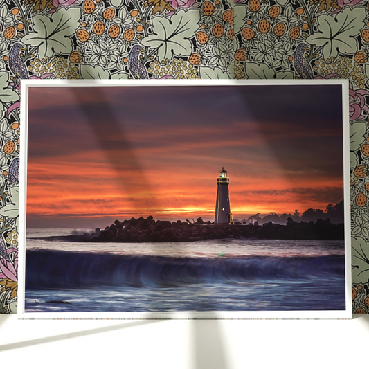a picture of a lighthouse on a wall