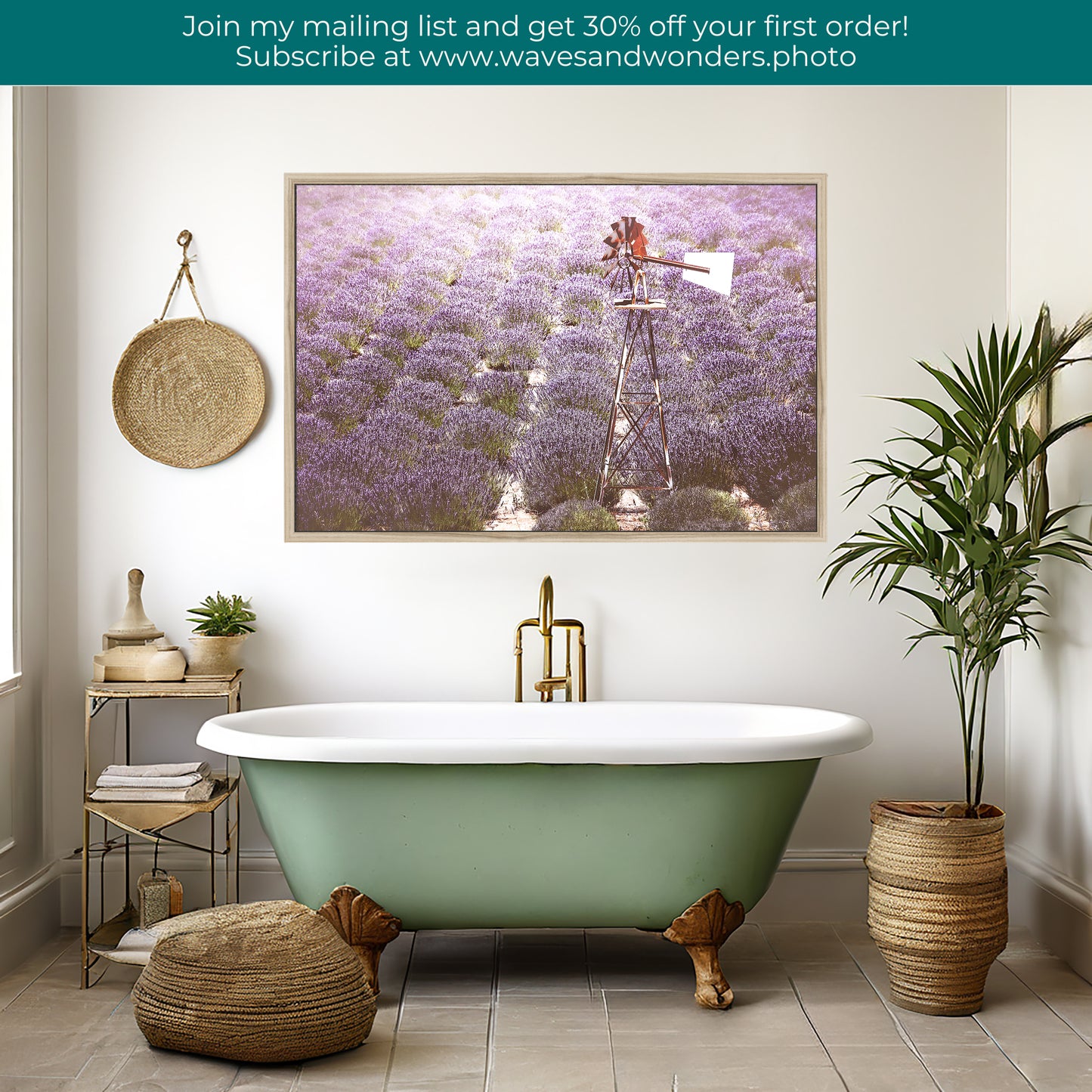 a bathroom with a tub and a painting on the wall