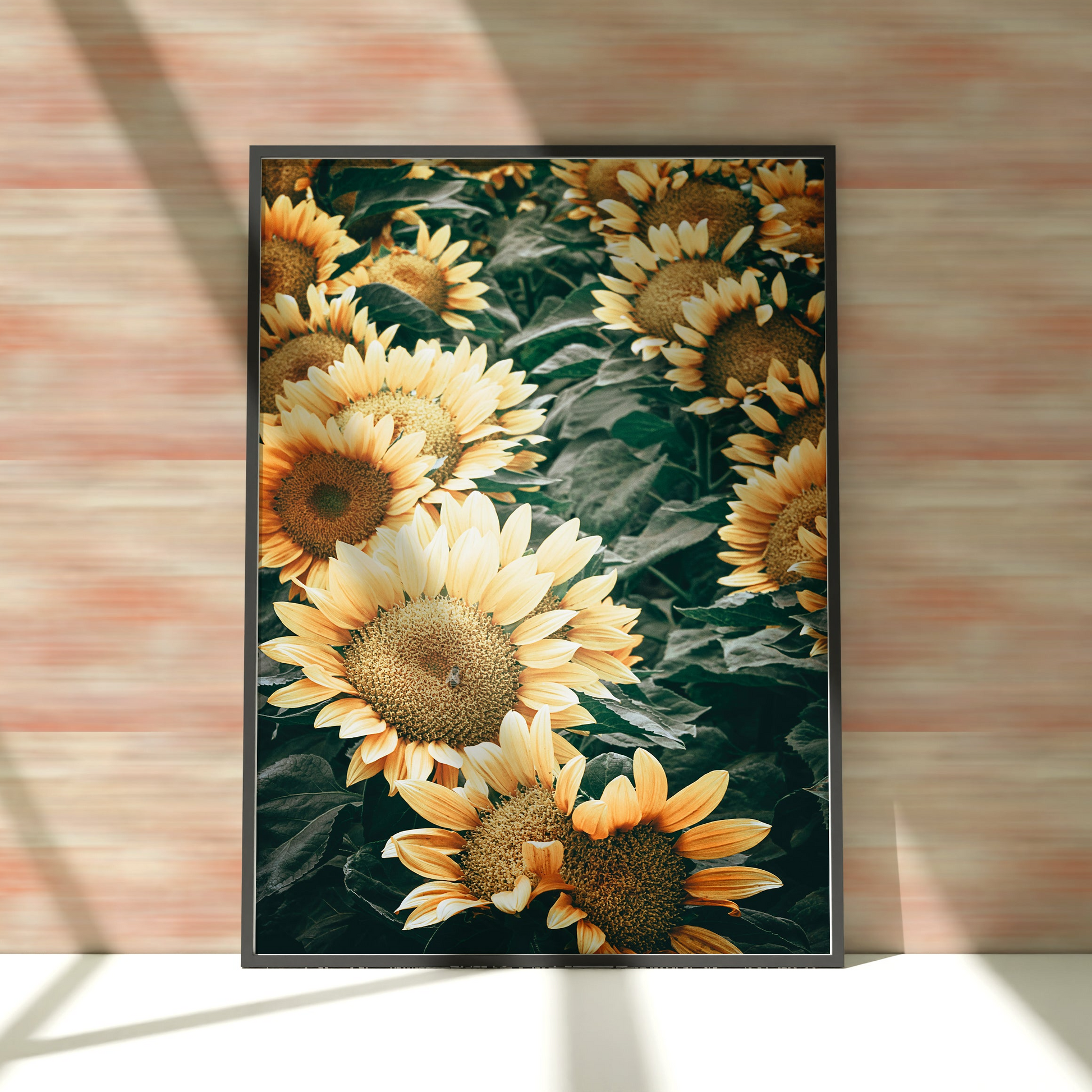 a picture of a bunch of sunflowers on a wall