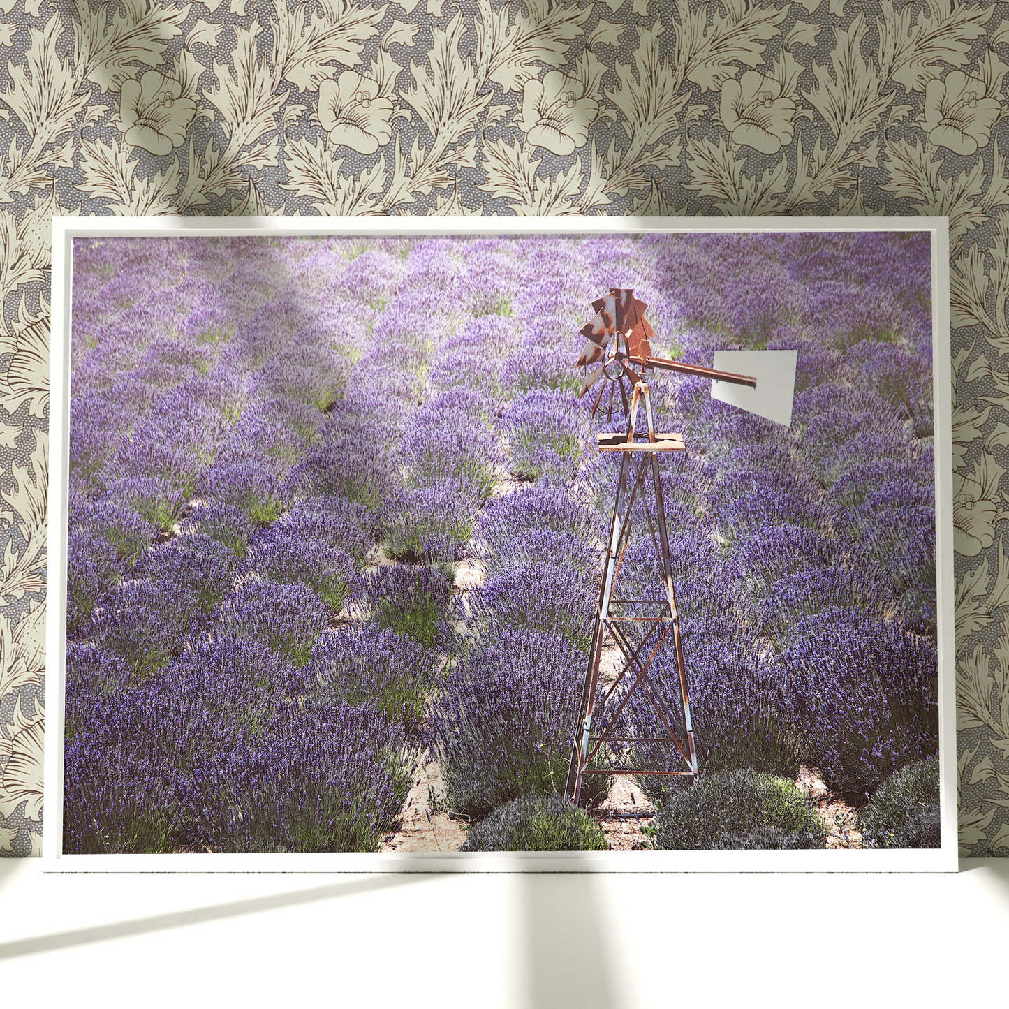 a picture of a windmill in a lavender field