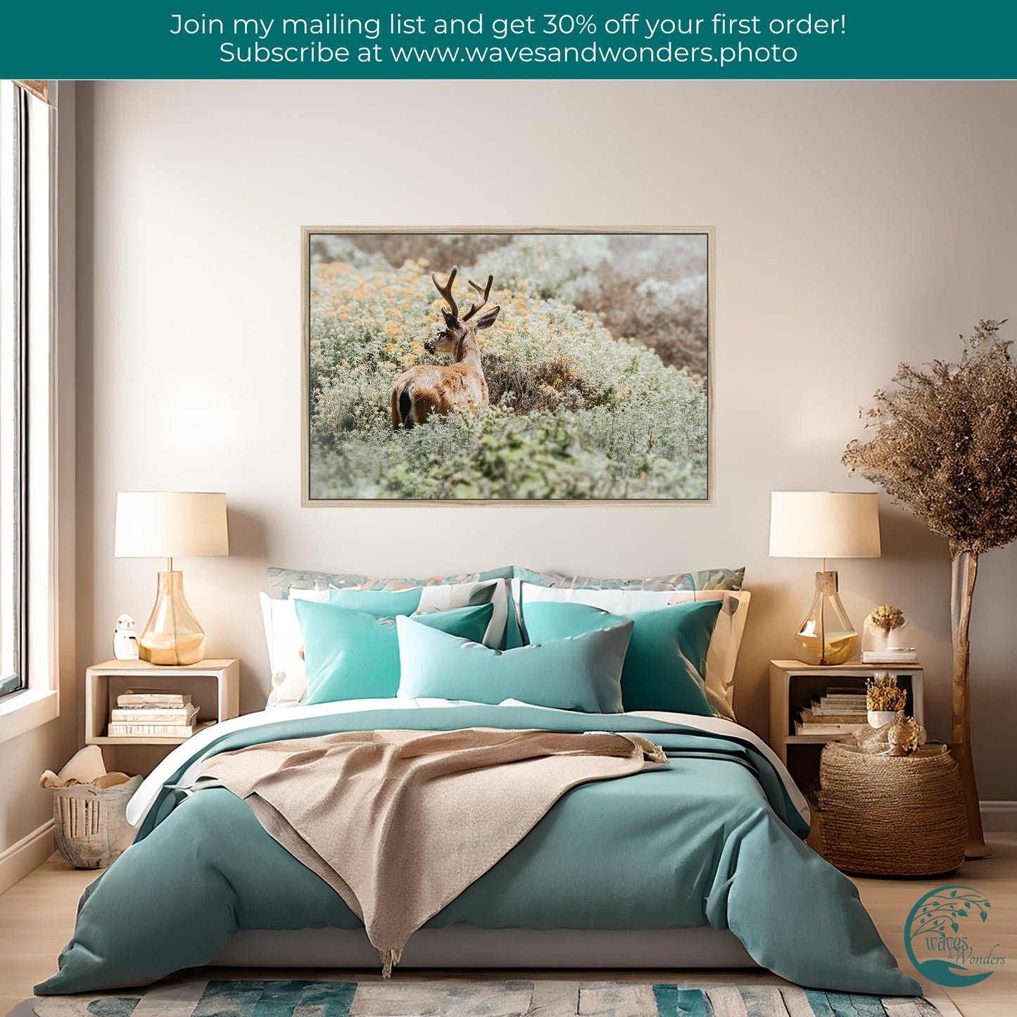 a picture of a deer on a wall above a bed