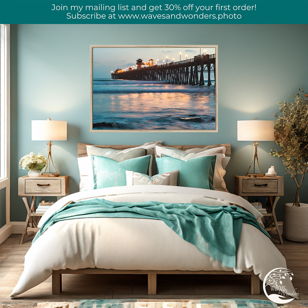 a bedroom with a picture of a pier on the wall