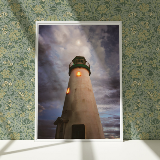a picture of a lighthouse on a wall