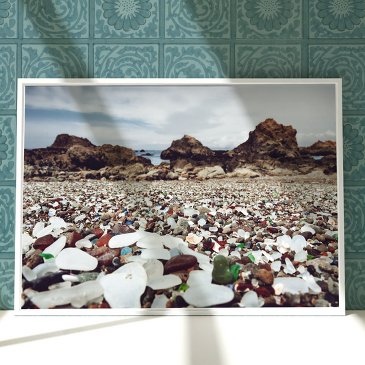 a picture of a beach covered in sea glass