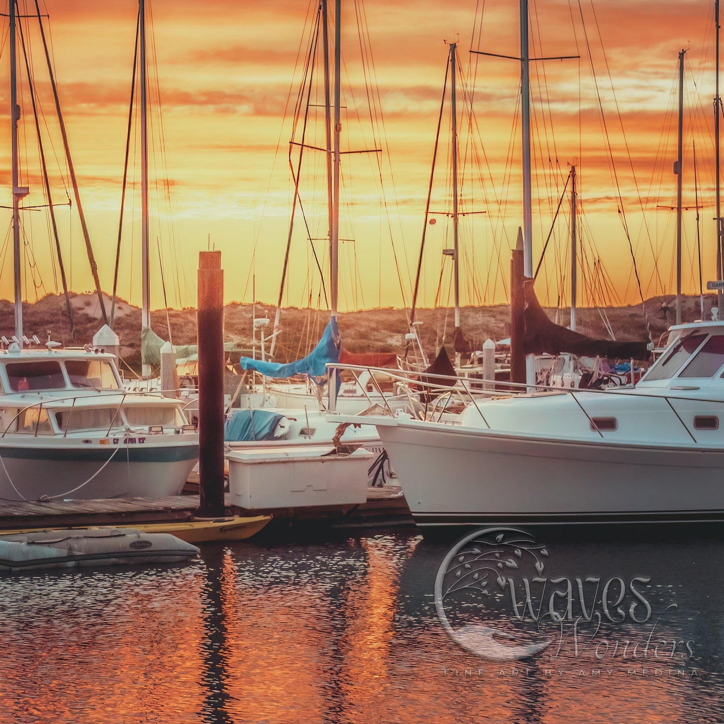 a group of boats docked at a marina