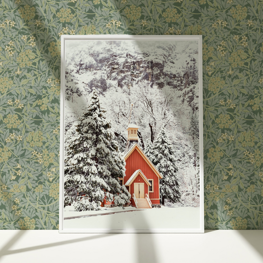 a picture of a red house in the snow