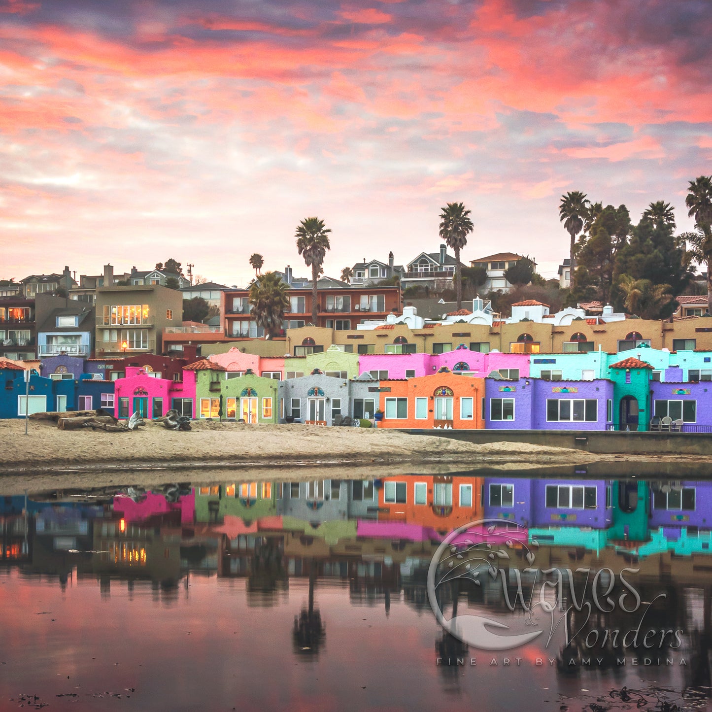 colorful houses are reflected in a body of water