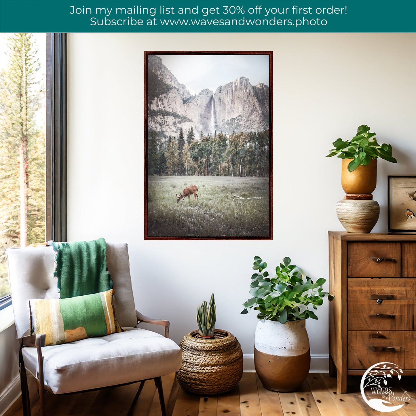 a living room with a chair and a painting on the wall