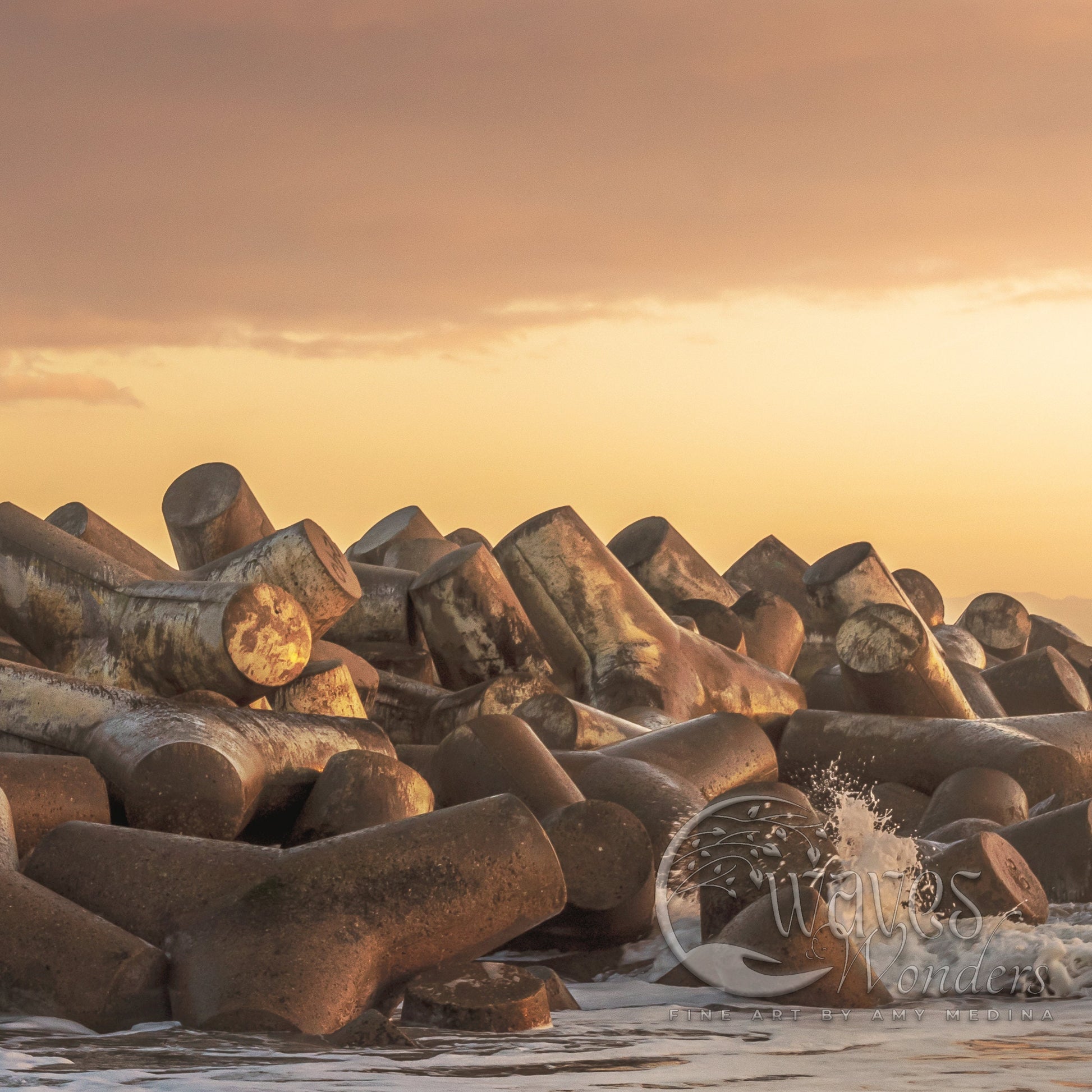 a bunch of large rocks sitting in the water