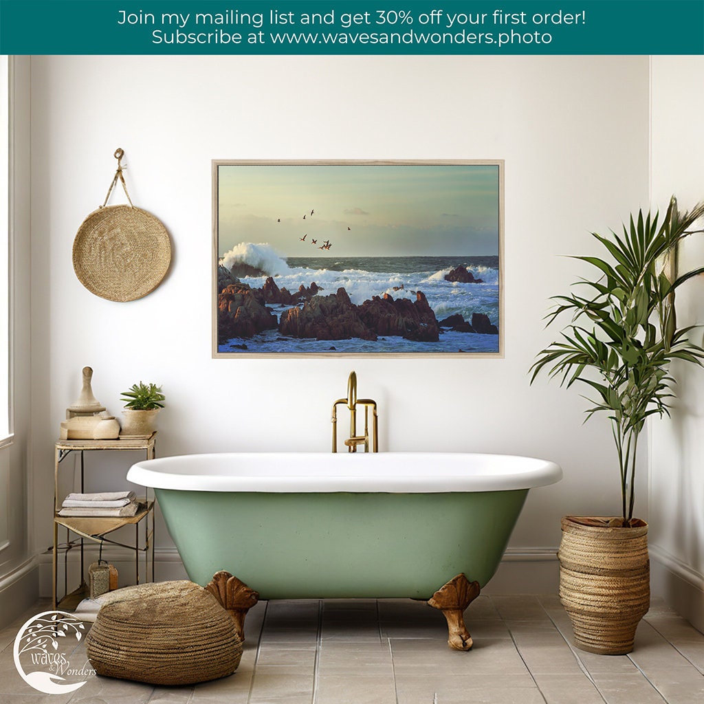 a bathroom with a claw foot tub and a painting on the wall