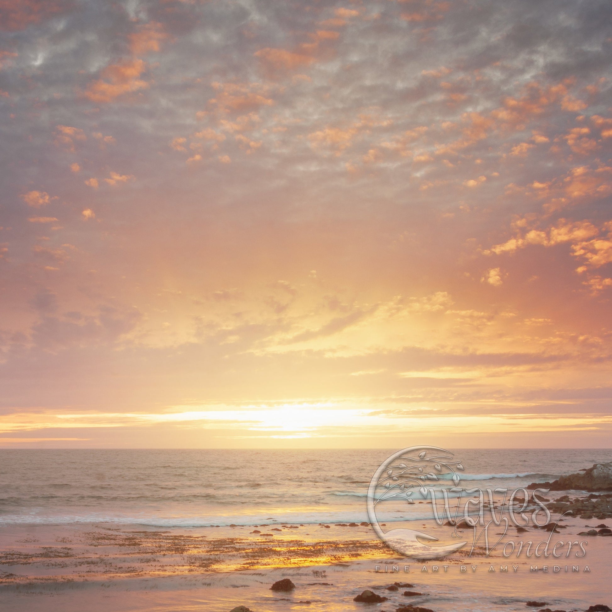 the sun is setting over the ocean on the beach