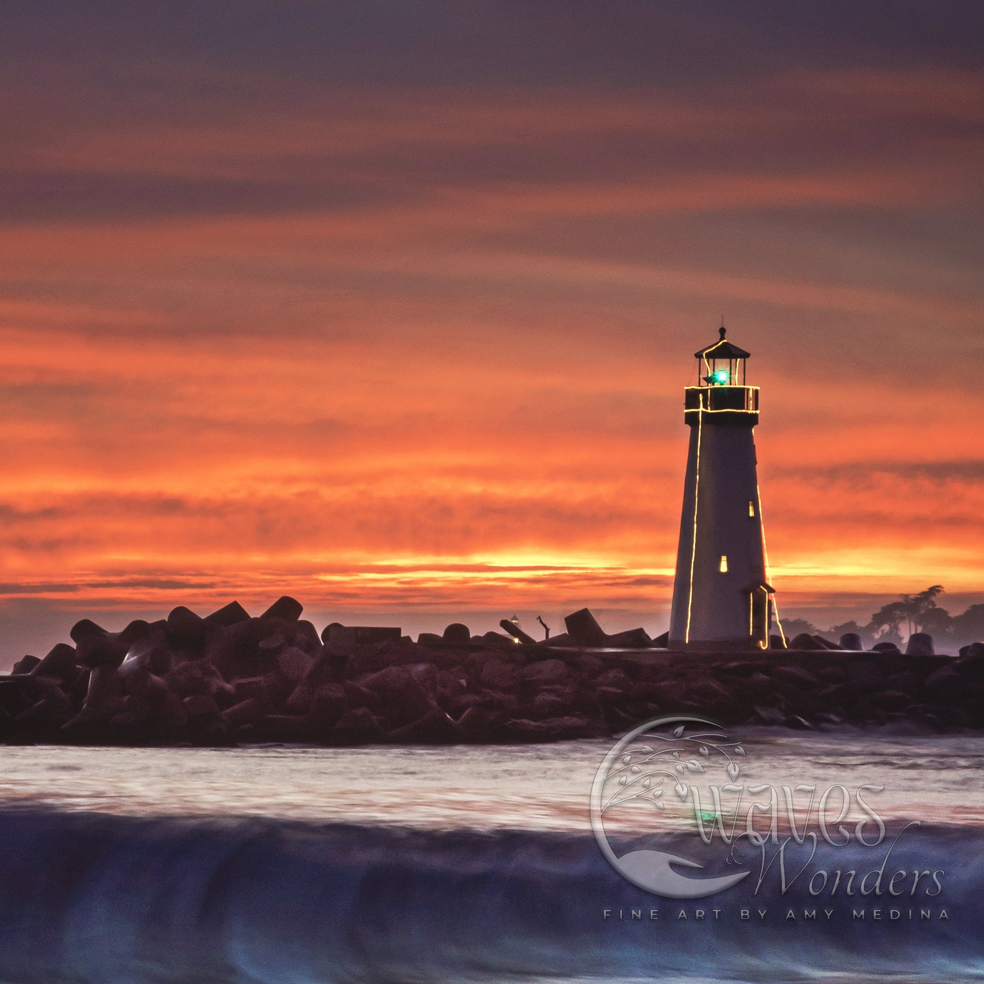 a light house sitting on top of a body of water