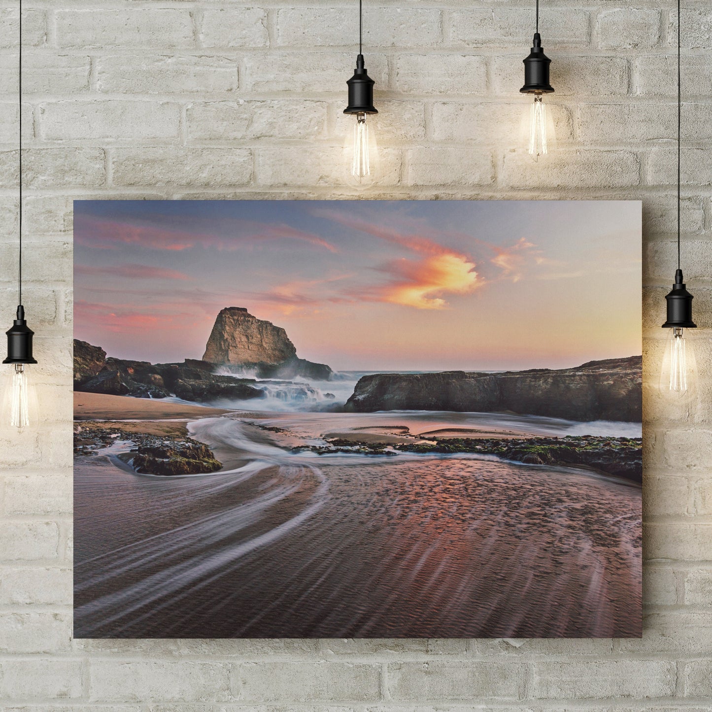 a painting hanging on a wall above a beach