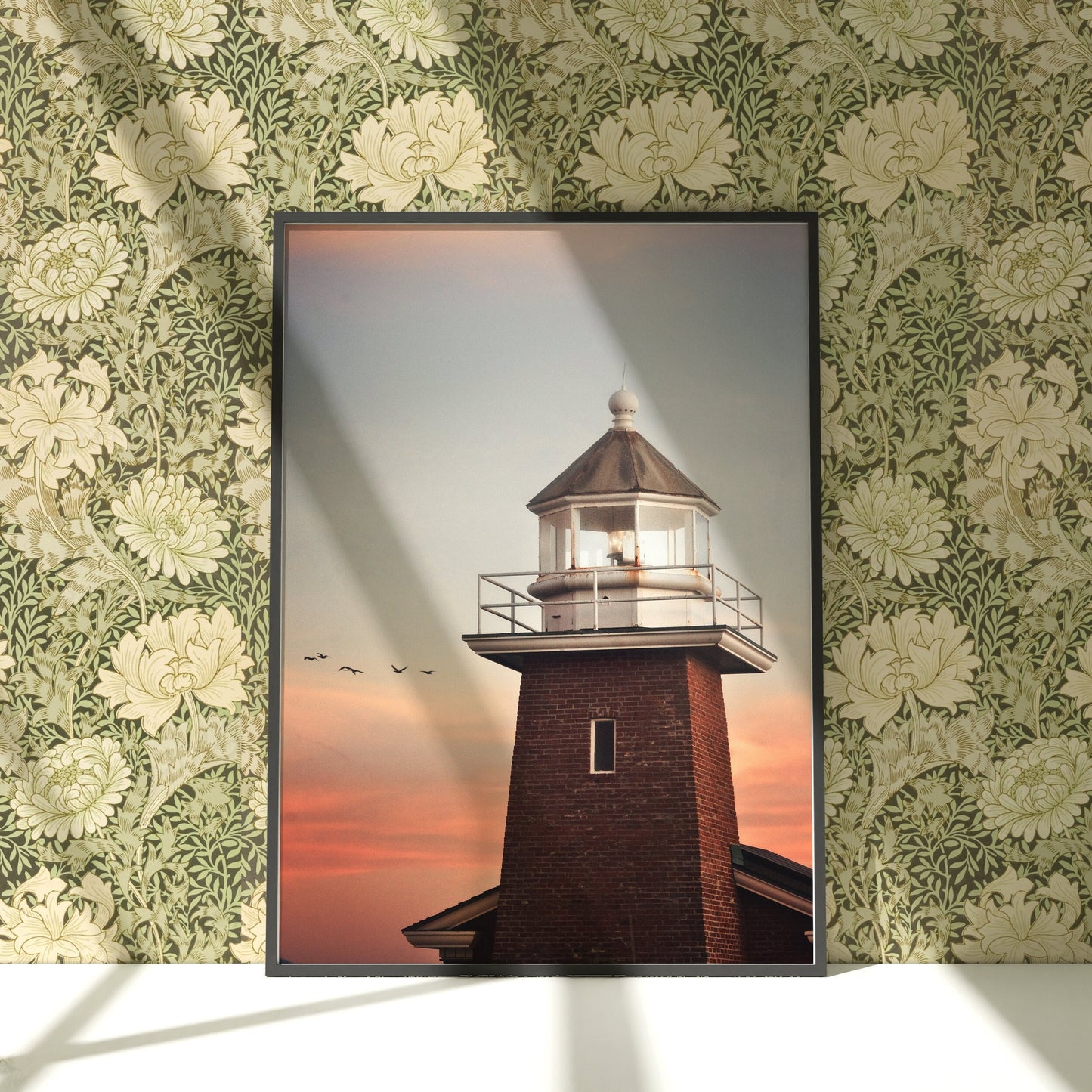 a picture of a lighthouse on a wall