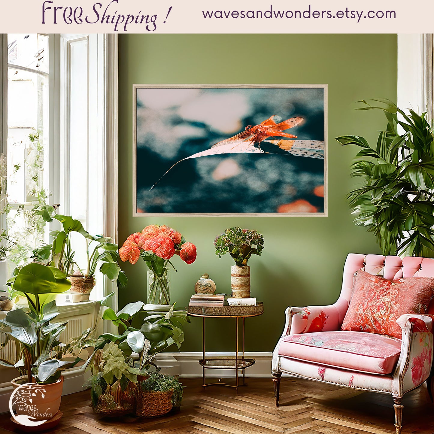 a living room with green walls and a pink chair