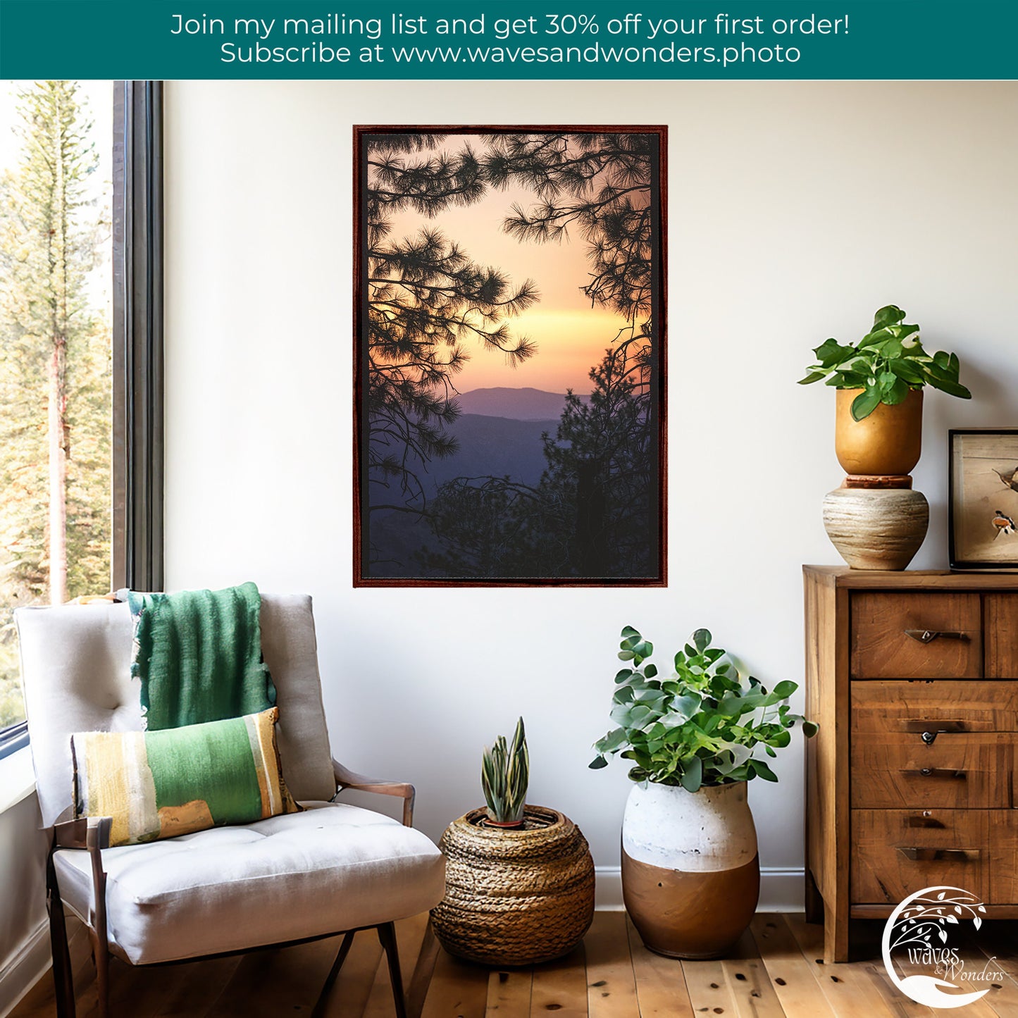 a living room with a chair and a painting on the wall