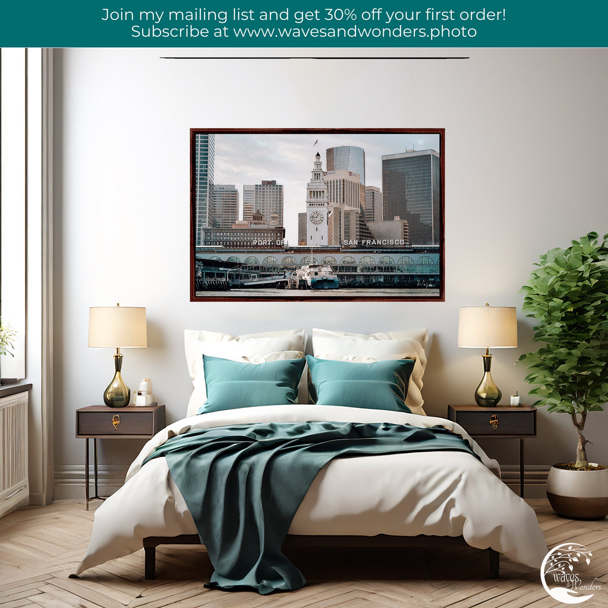 a bedroom with a picture of a city on the wall above the bed