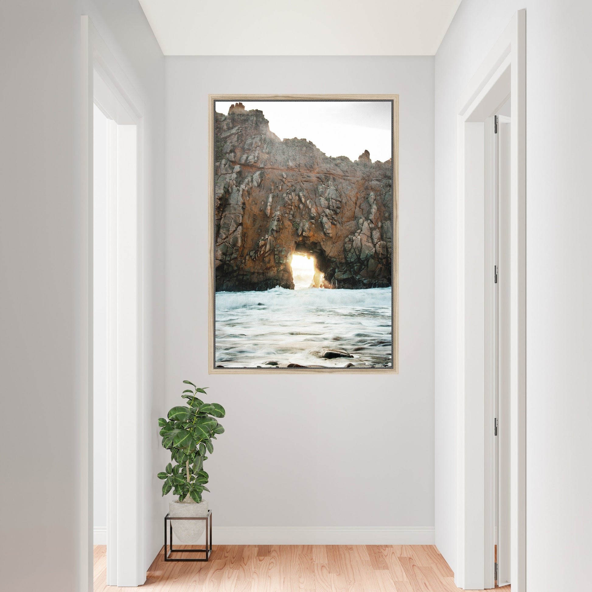 a painting hanging on a wall in a hallway