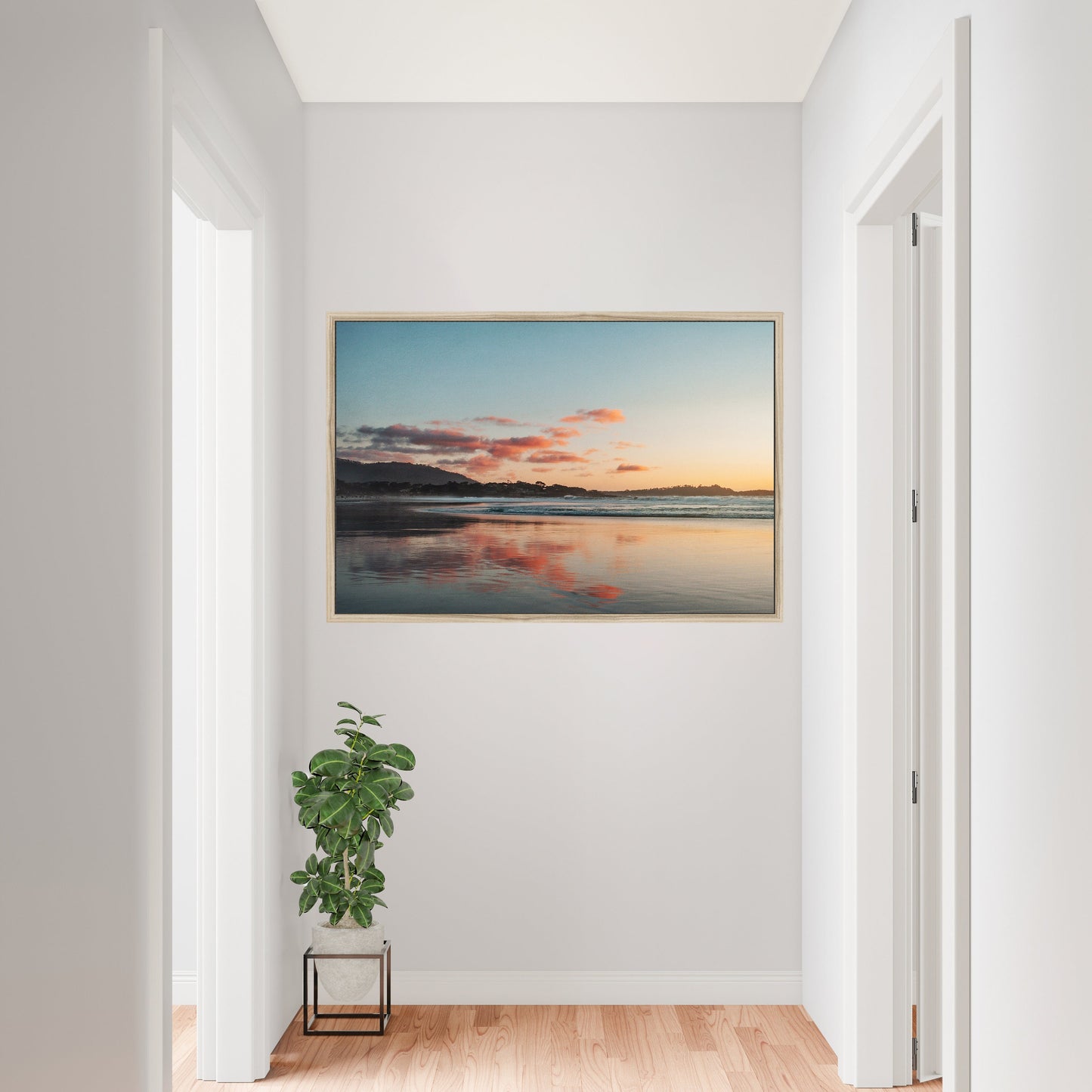 a painting hanging on the wall of a hallway