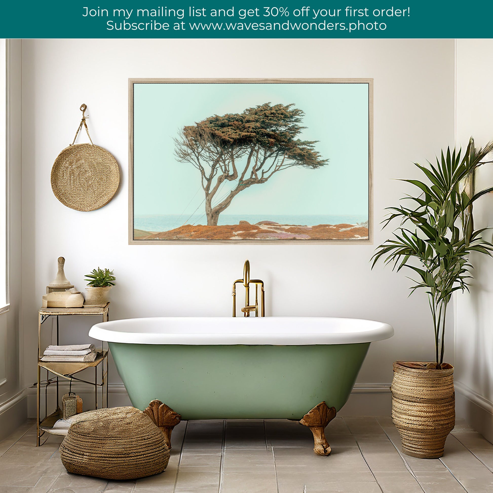 a bathroom with a bathtub, potted plants and a painting on the wall