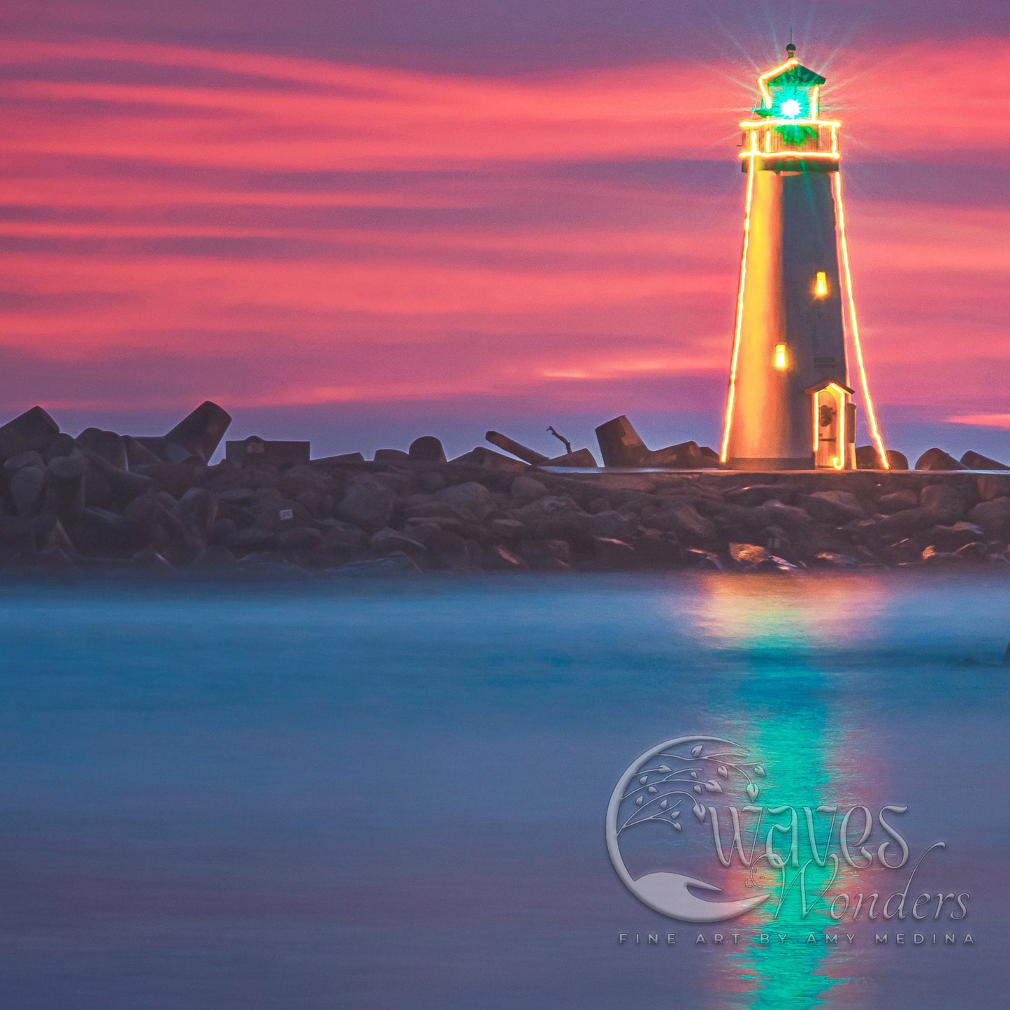 a light house sitting on top of a rocky shore