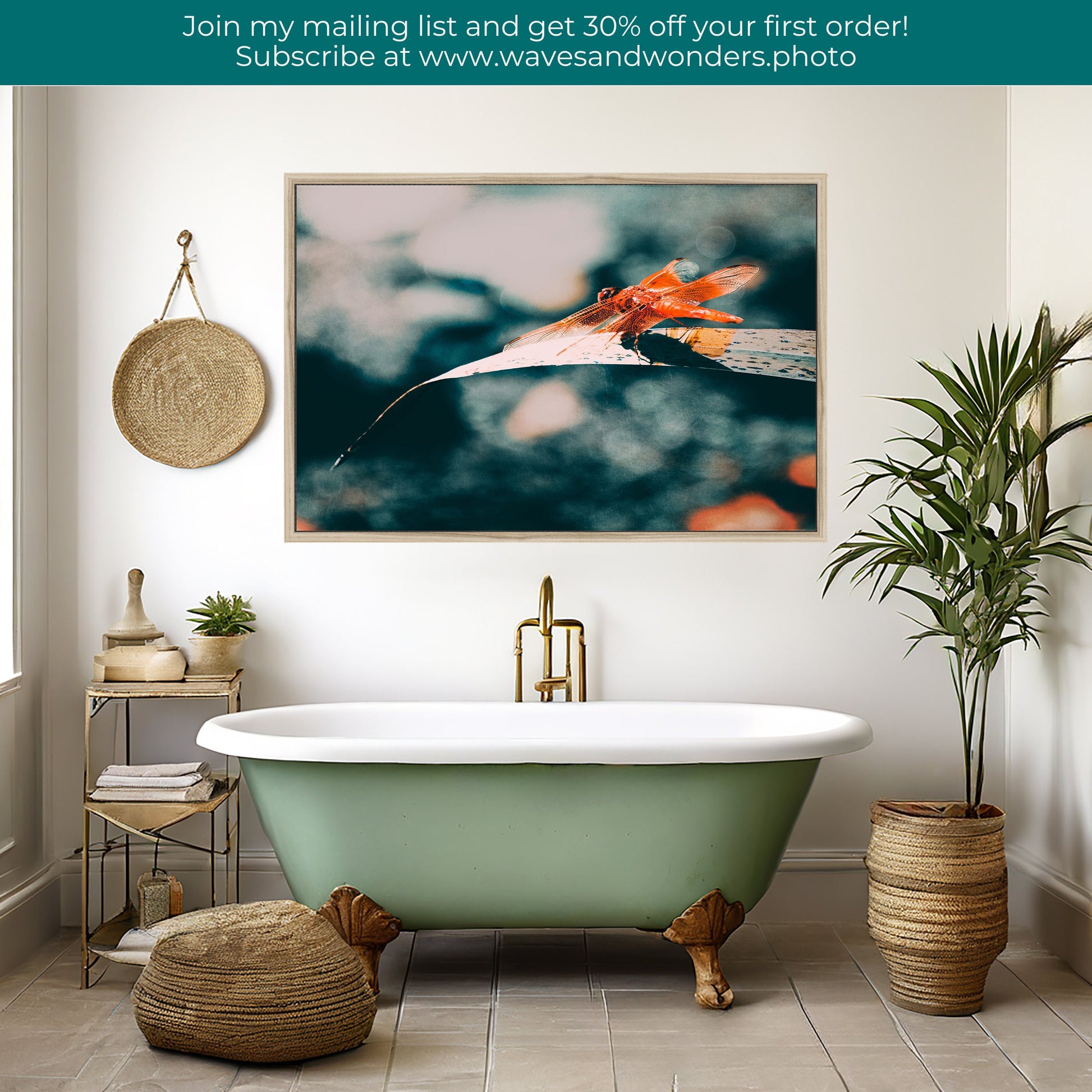 a bathroom with a tub and a painting on the wall