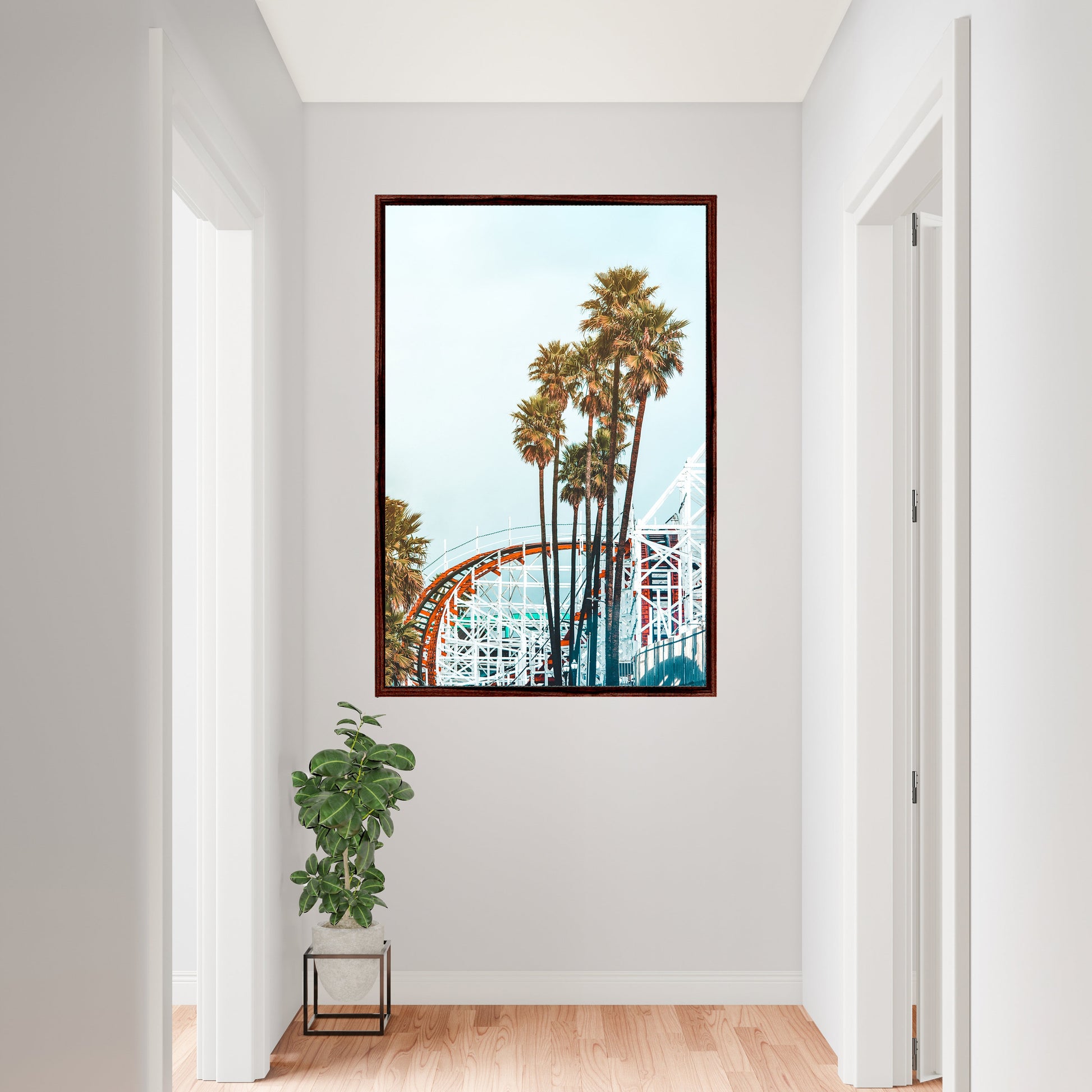 a picture of a roller coaster and palm trees