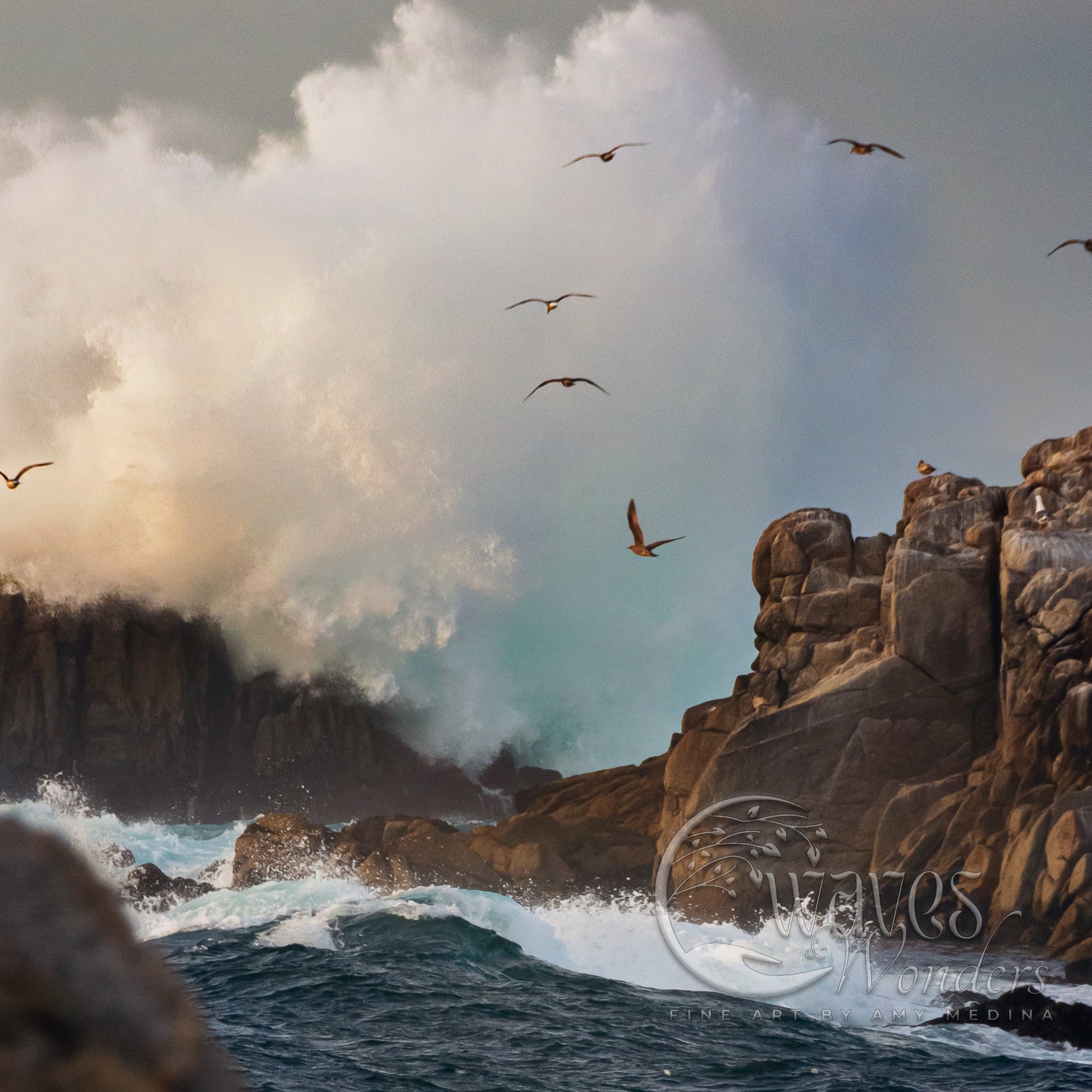 a flock of birds flying over the ocean