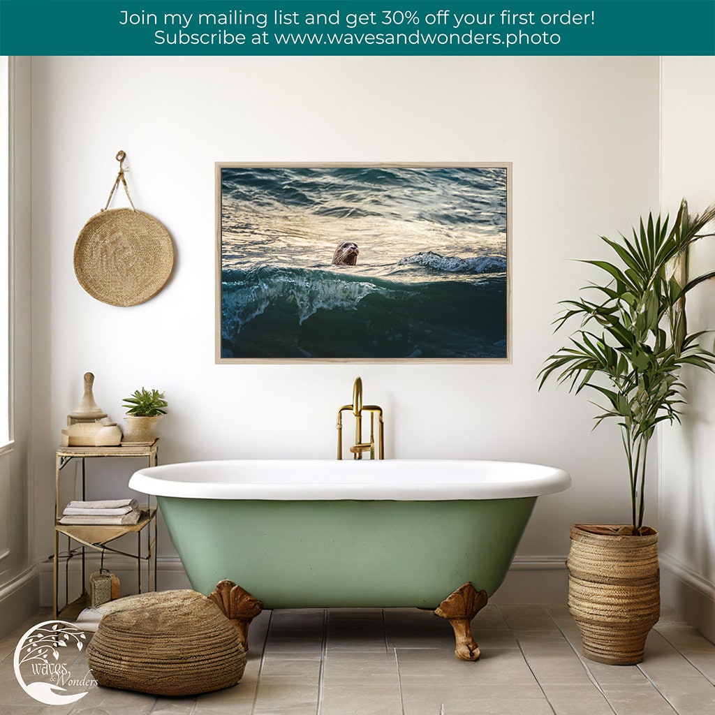 a bathroom with a tub and a painting on the wall