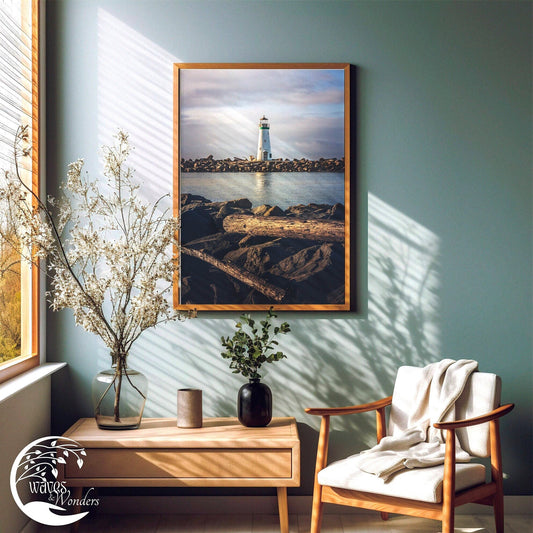 a painting of a lighthouse hangs on a wall