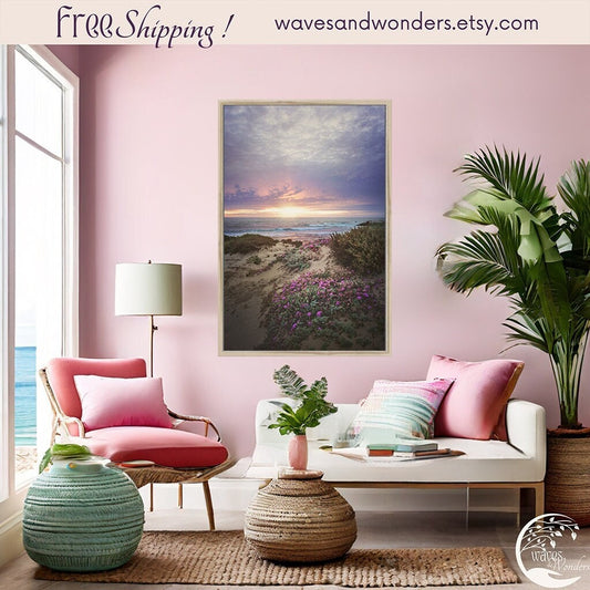 a living room with pink walls and a painting on the wall