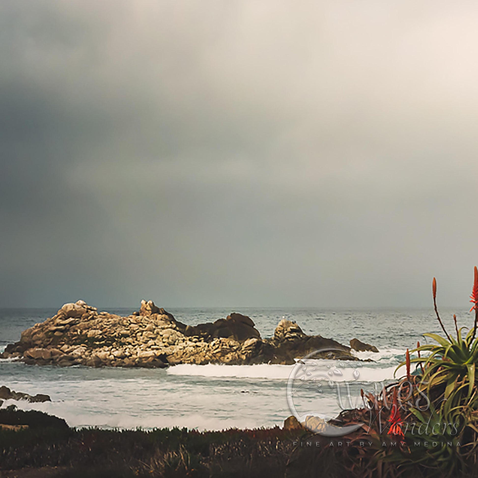 a view of a body of water with a rock outcropping in the