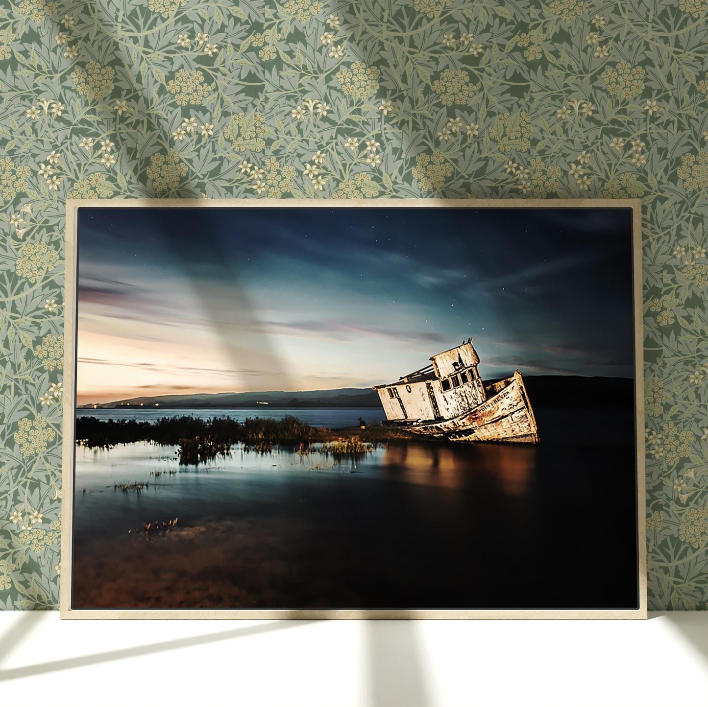 a picture of a boat sitting on top of a lake