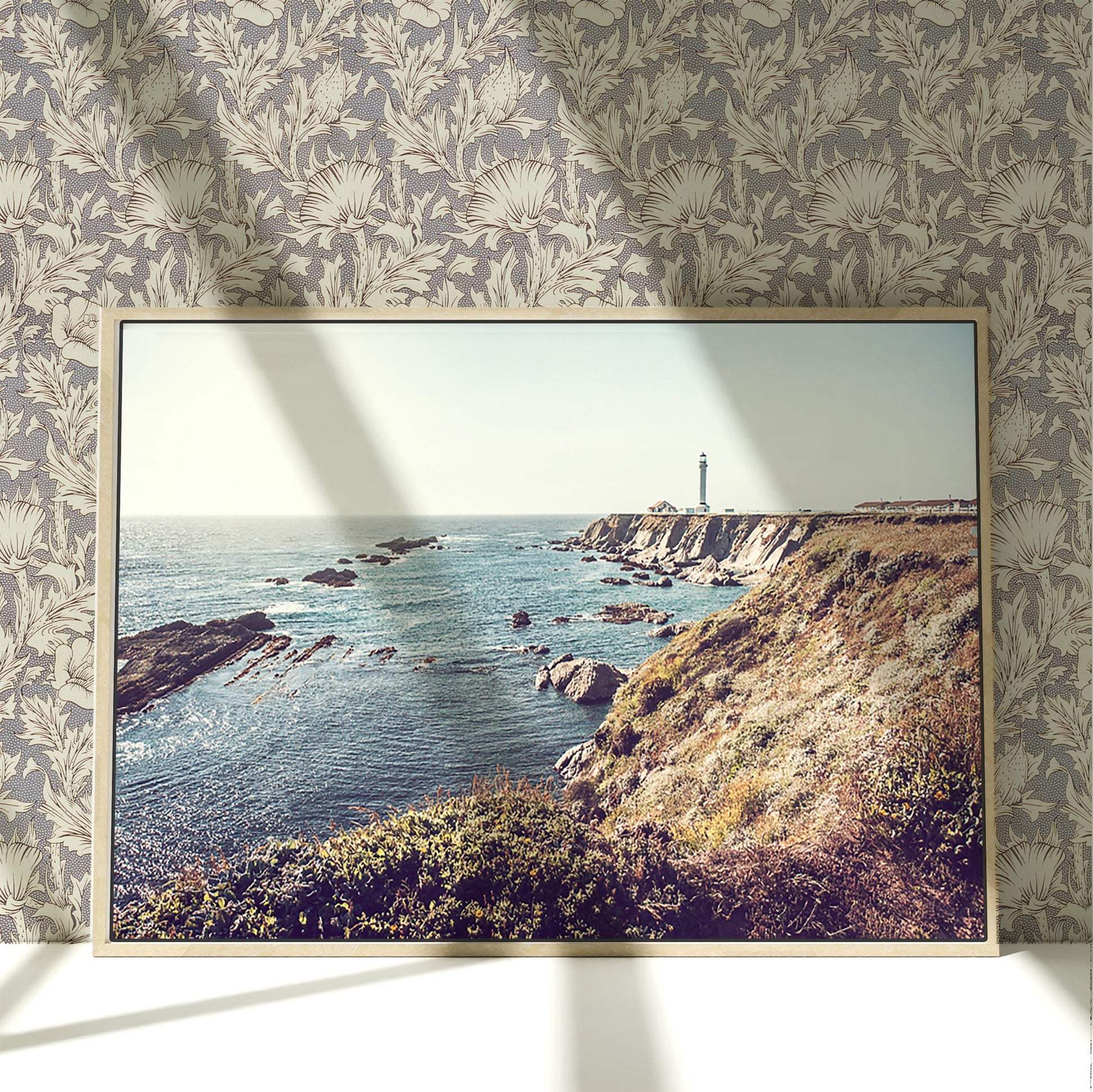 a picture of a picture of a lighthouse on a wall