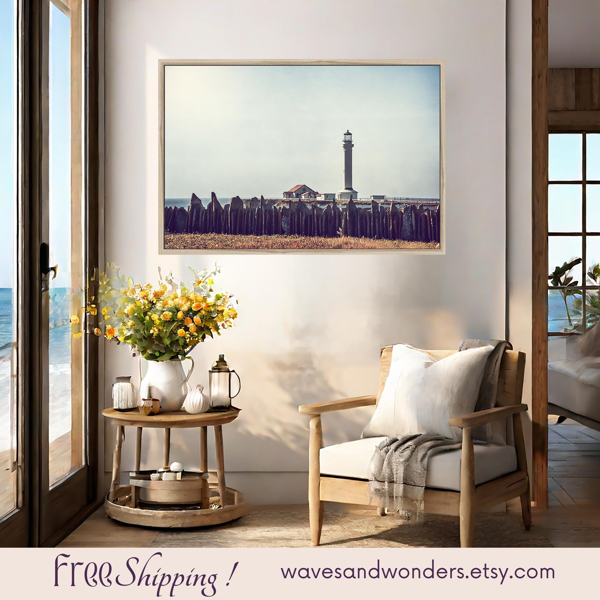 a living room with a picture of a lighthouse on the wall