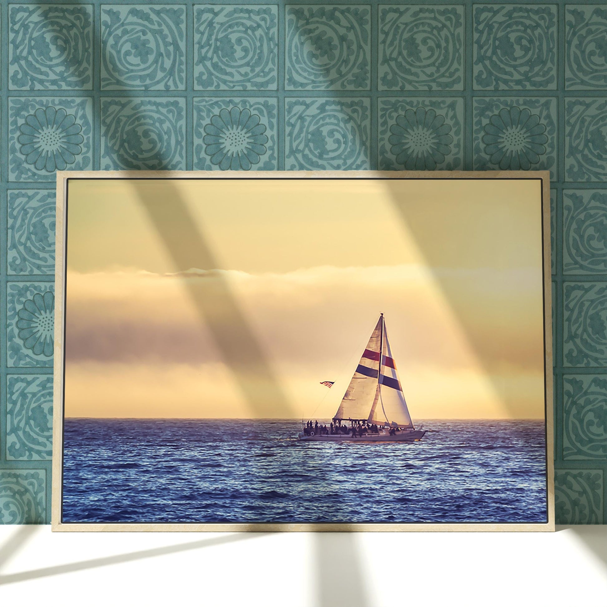 a painting of a sailboat in the ocean