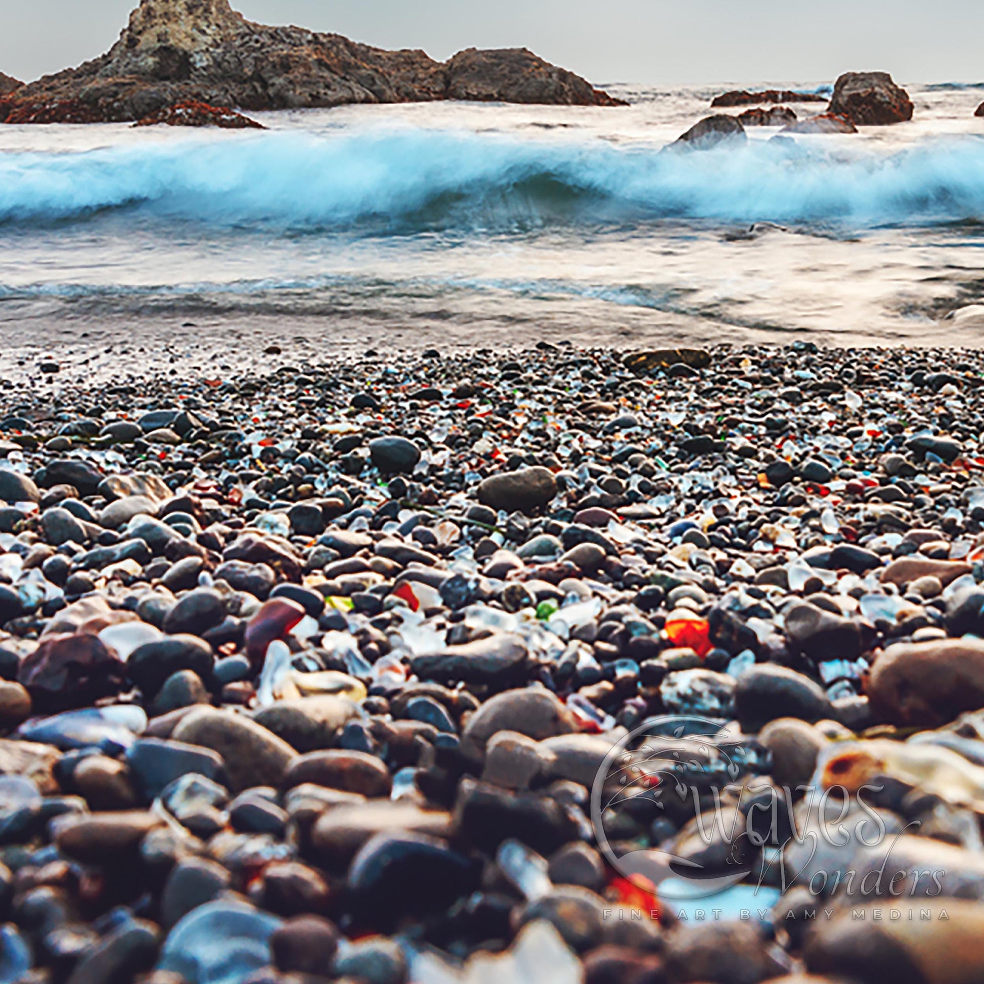 a bunch of rocks that are on the beach