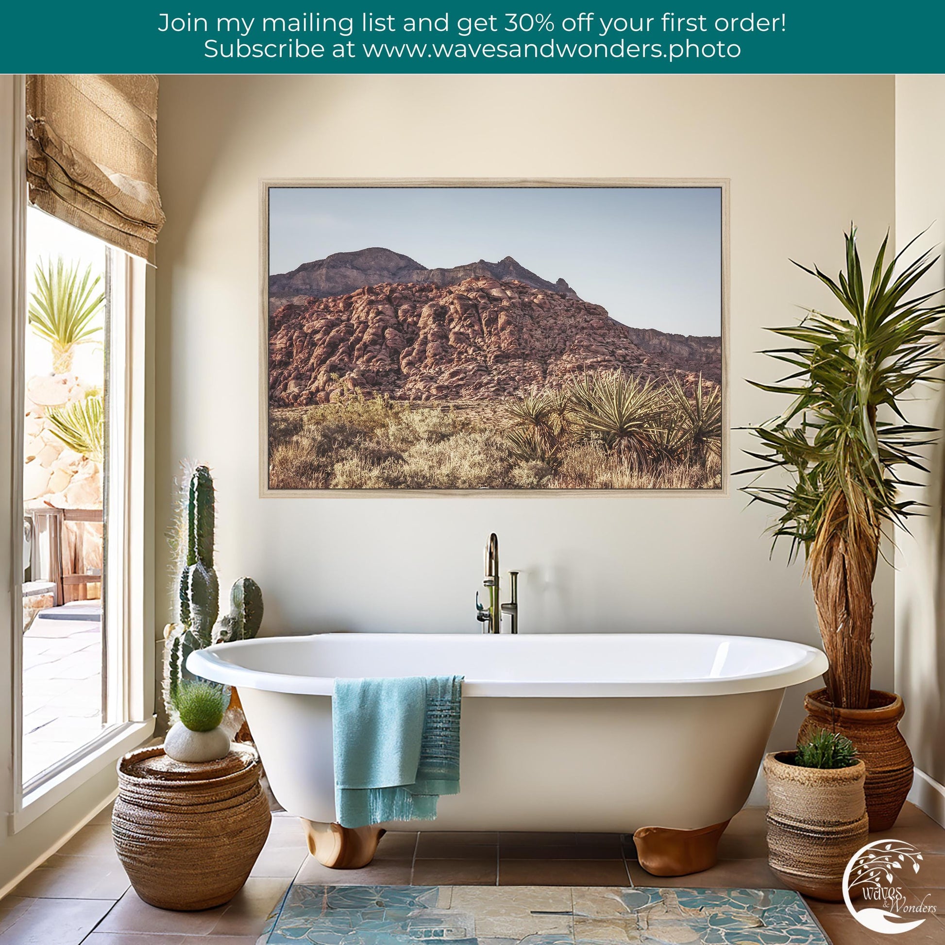 a bathroom with a tub and a painting on the wall