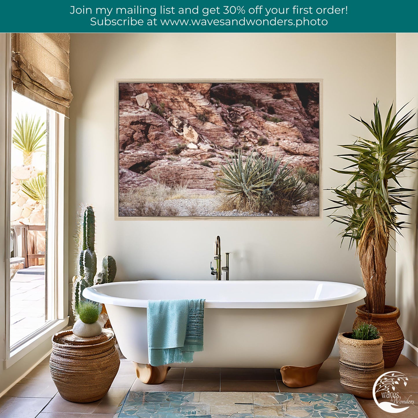 a bathroom with a tub and a painting on the wall