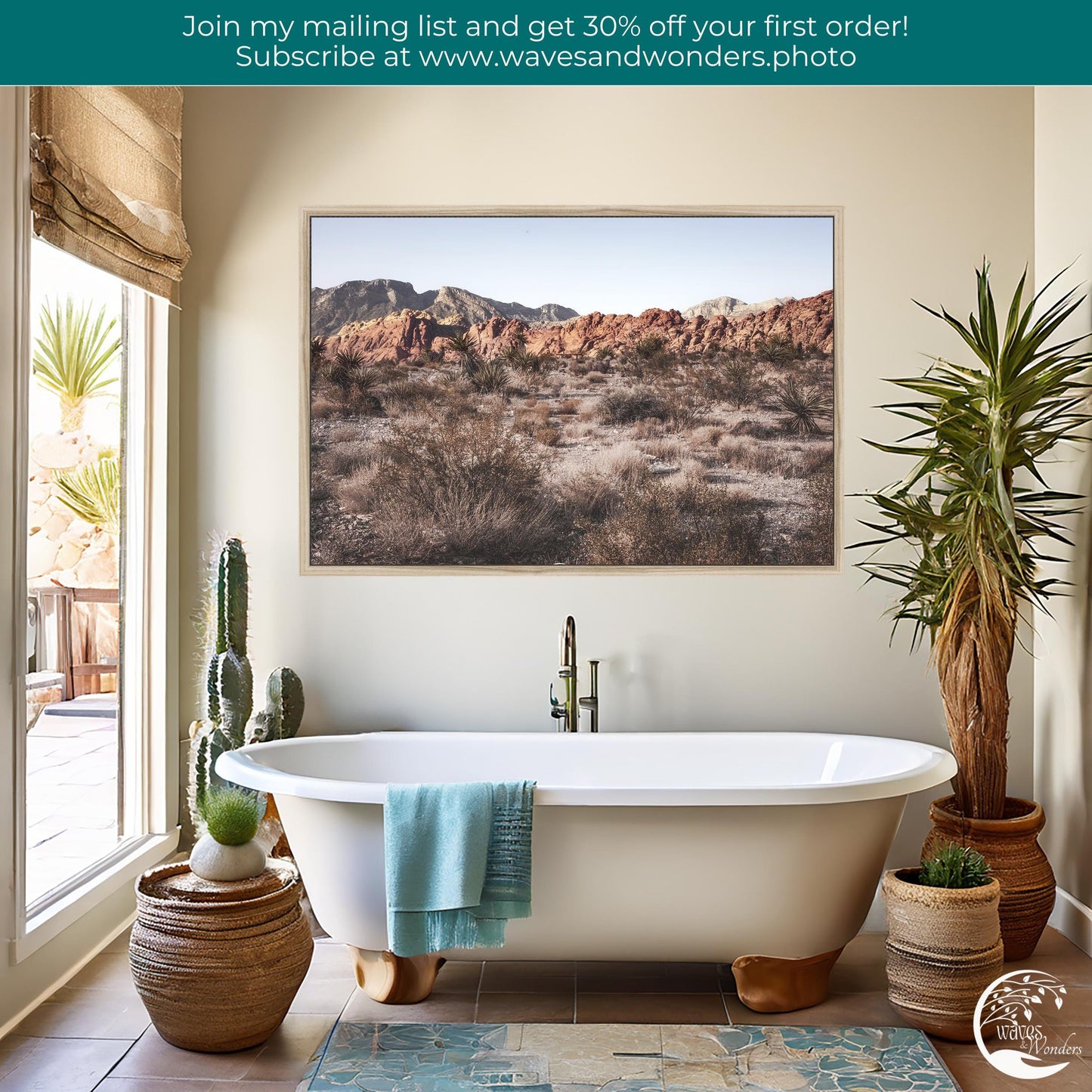 a bathroom with a tub and a painting on the wall