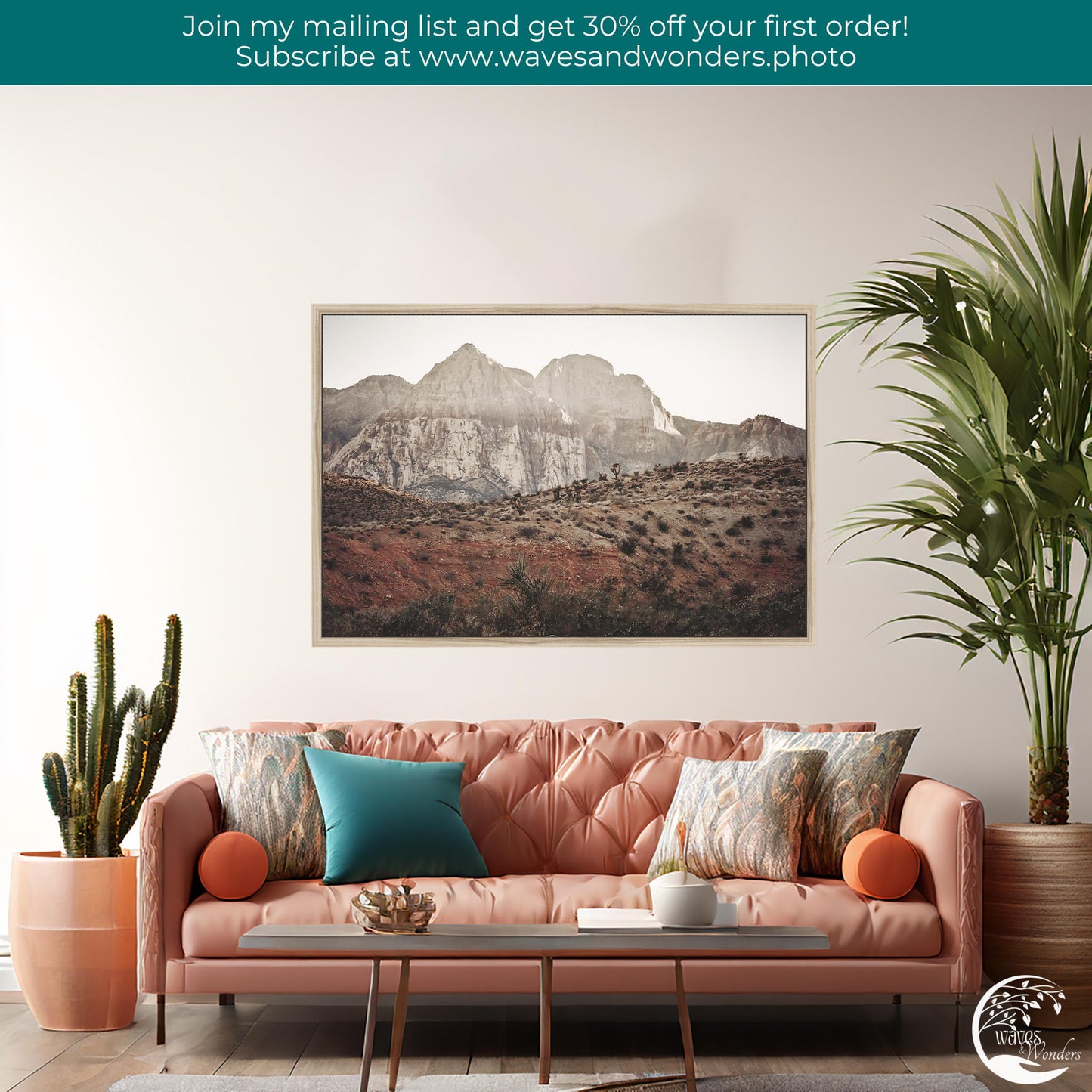 a living room with a pink couch and a potted plant