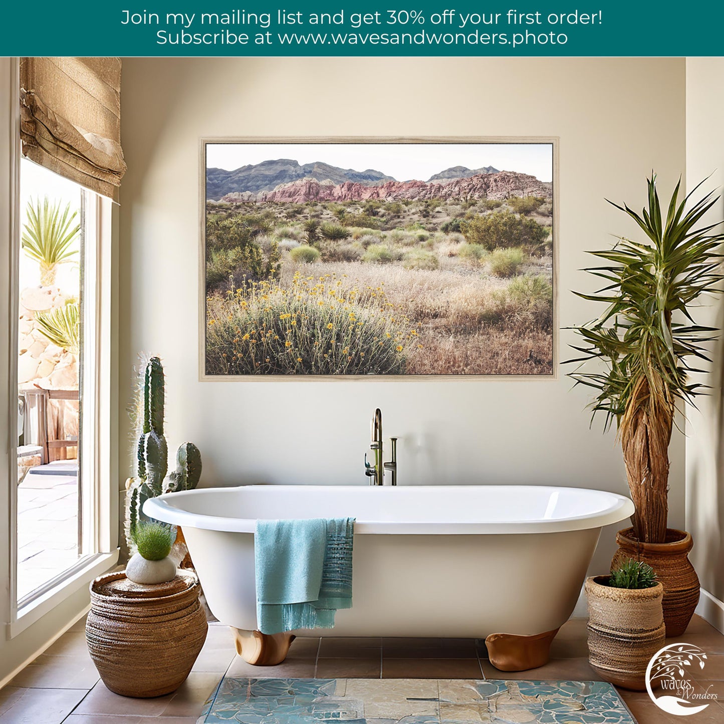 a bathroom with a tub and a painting on the wall