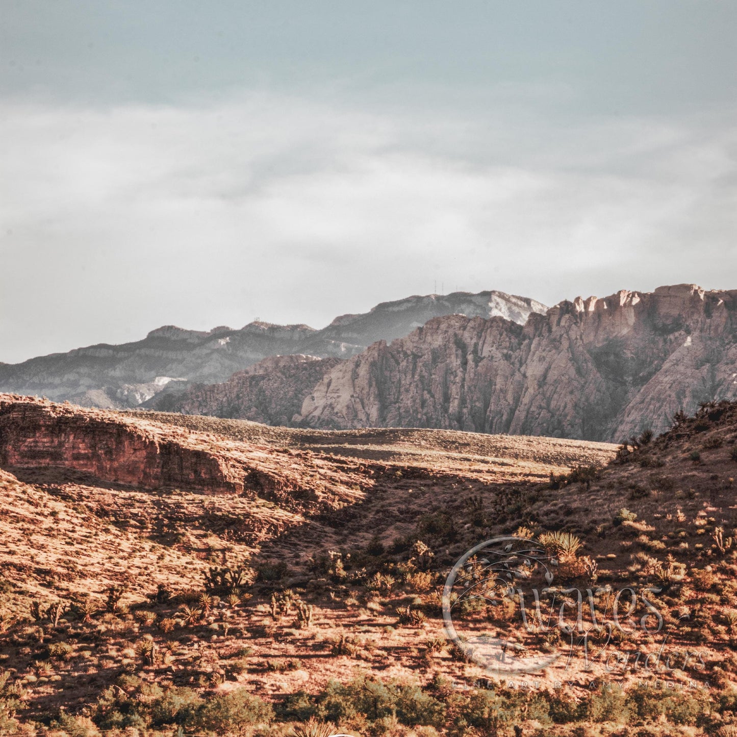 a view of a mountain range in the desert