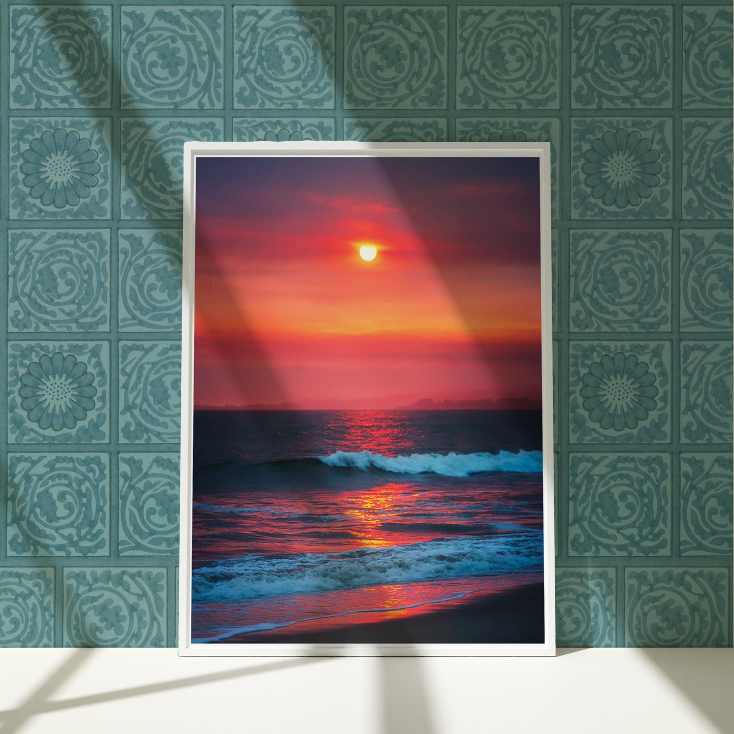 a painting of a sunset over the ocean