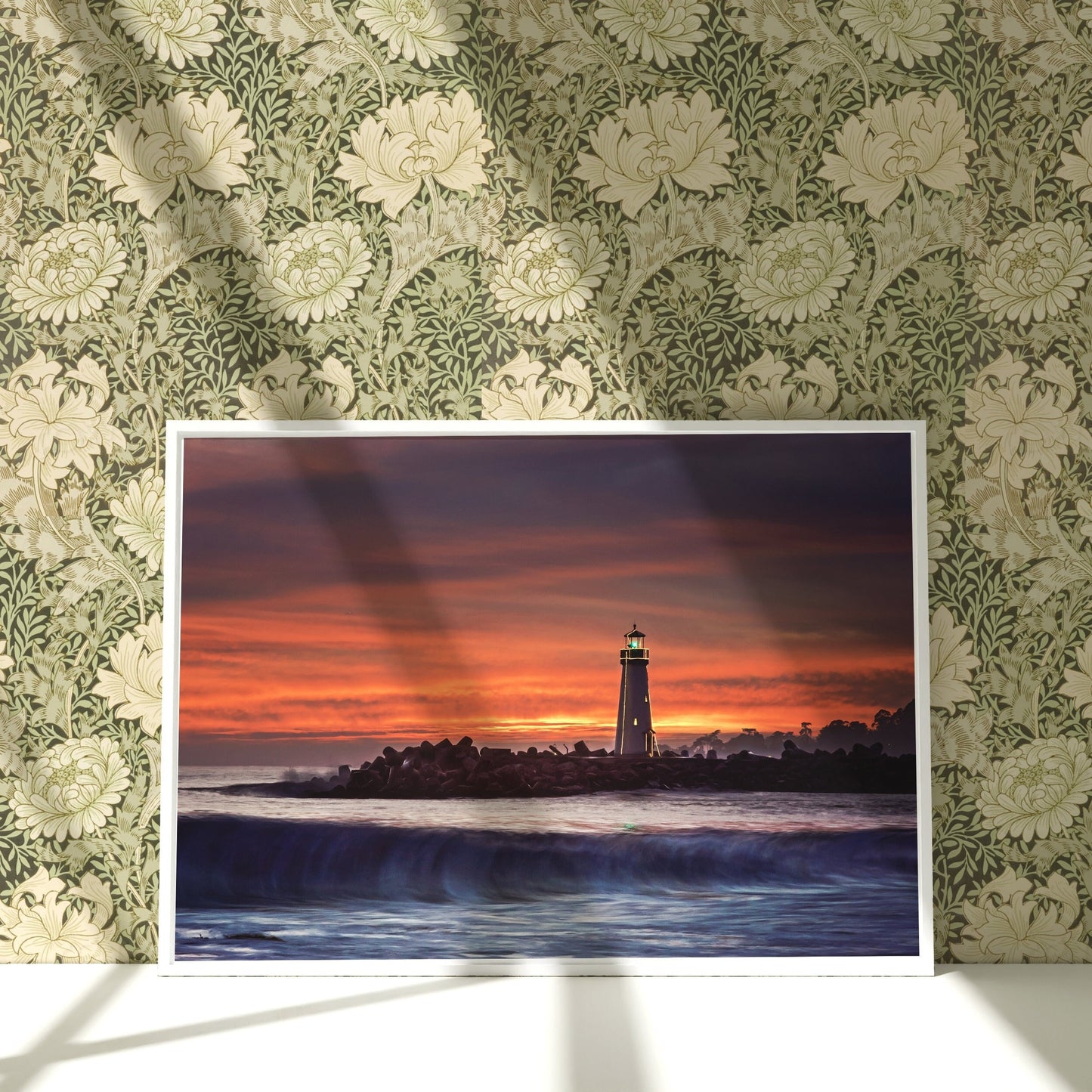 a picture of a lighthouse on a wall