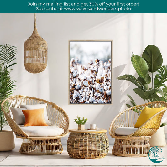 a living room with wicker furniture and plants