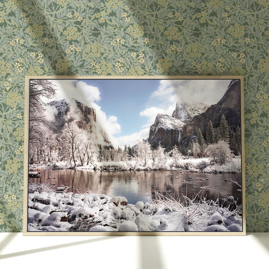 a picture of a mountain lake in the snow